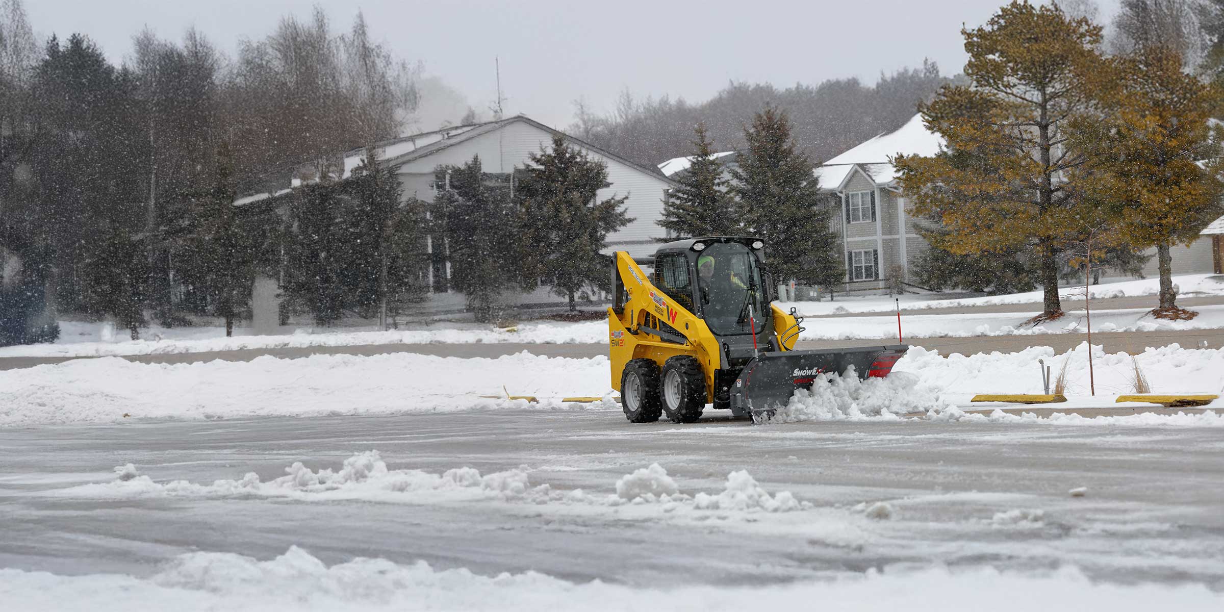 snowex skid steer products