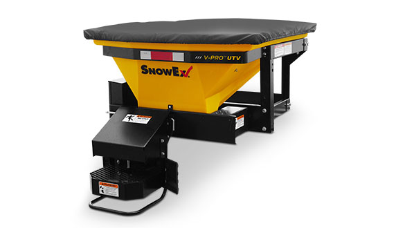 A yellow and black SnowEx V-Pro UTV salt spreader with a covered top, designed for utility vehicles to spread salt or sand in winter conditions. Ideal for efficient material distribution.