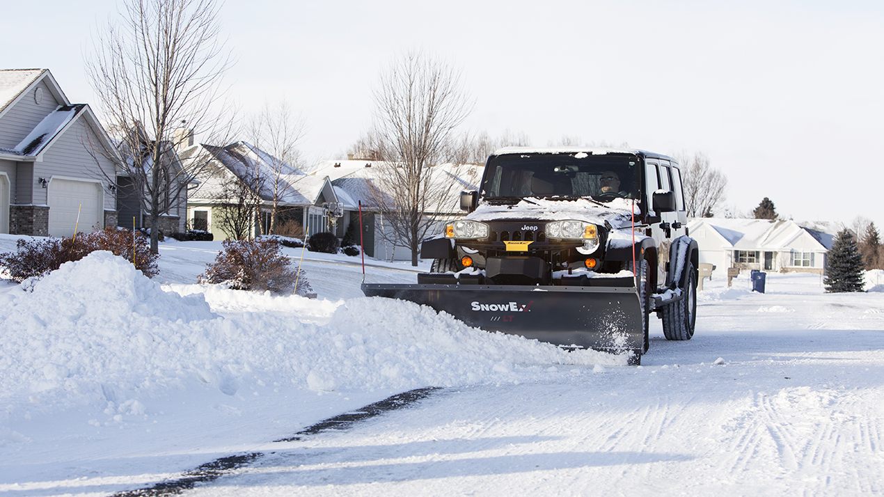 snowex plow on jeep