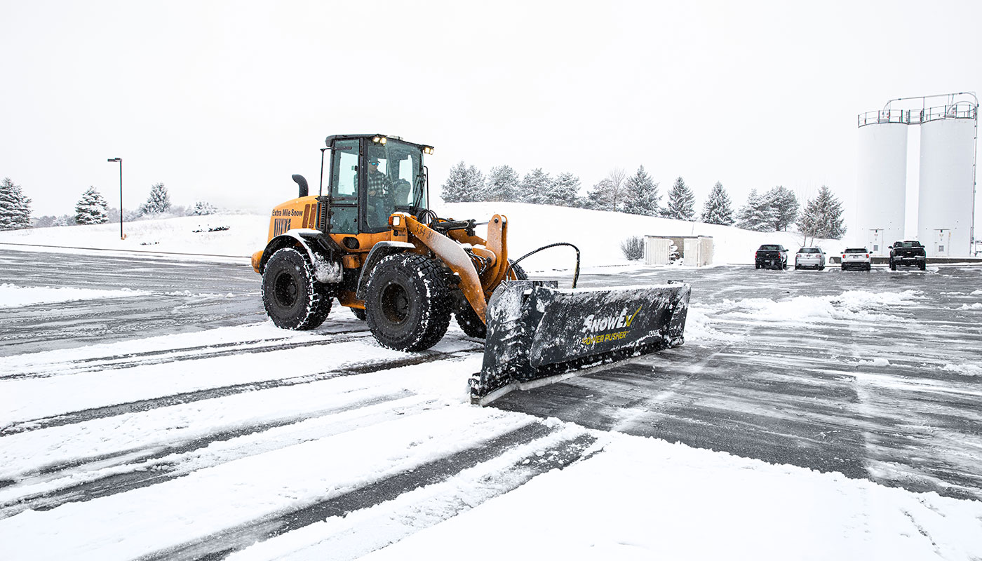 POWER PUSHER PRO Hydraulic-Wing Pusher Plow | SnowEx®